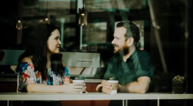 man and woman talking over coffee-2