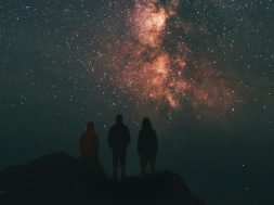 Three-people-looking-up-at-night-sky-by-Benjamin-Davies.jpg