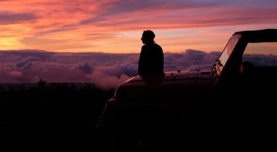 Man-looking-at-sunrise-by-Karl-Fredrickson-Unsplash.jpg