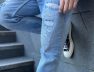 Man-wearing-denim-jeans.jpg