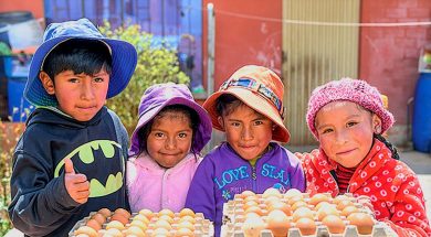 Children-with-eggs-laid-by-their-own-chickens-as-part-of-SP-Development-programs.jpg