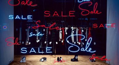 Fashion-store-with-Sale-signs-in-window.jpg